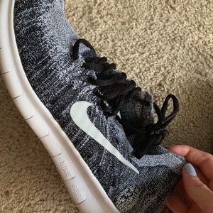 nike flyknit womens size 10 shoes, grey and black